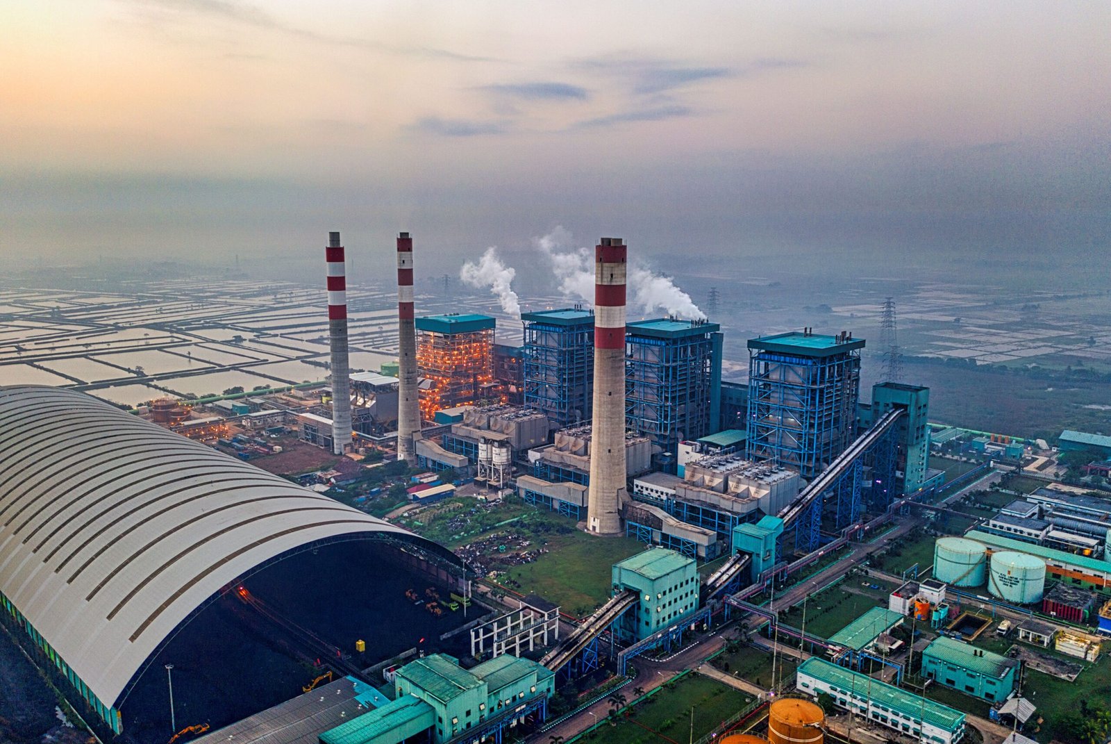 Aerial view of a large industrial plant in Banten, Indonesia, at dawn.
